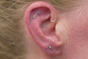 Double flat and lobe piercing